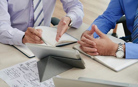 Ecommerce consulting services discussion with business professionals planning strategy