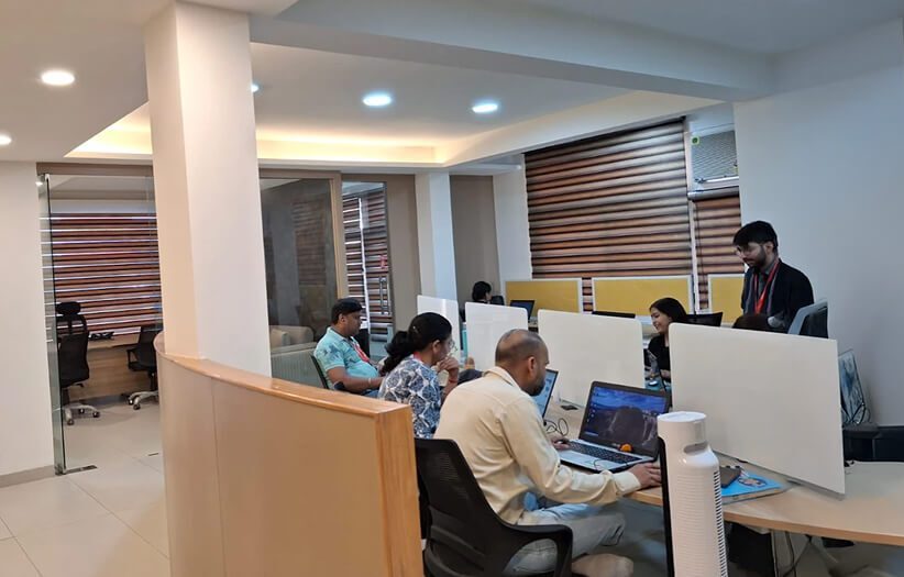 colleagues working together in a modern office, showcasing a culture of collaboration